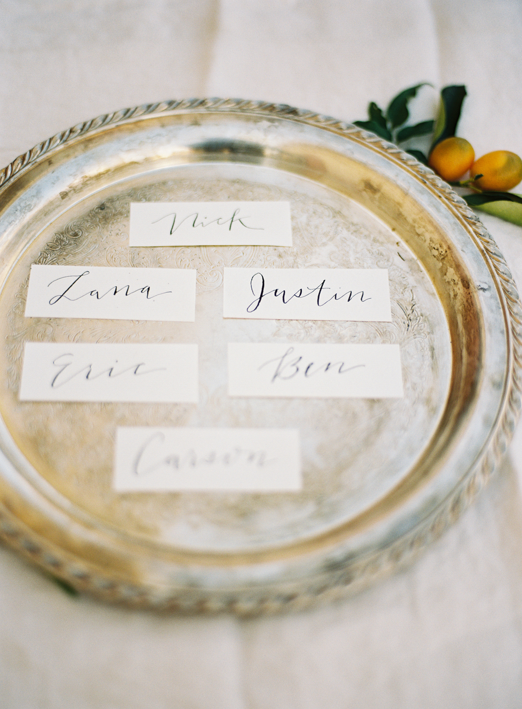 weddin day name cards with hand calligraphy by Tessa Shane and photographed on film
