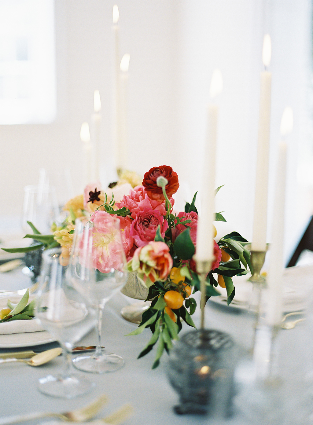 a wedding day table with candles from pottery barn and west elm and flowers by ashley beyer of tinge for a wedding in salt lake city utah