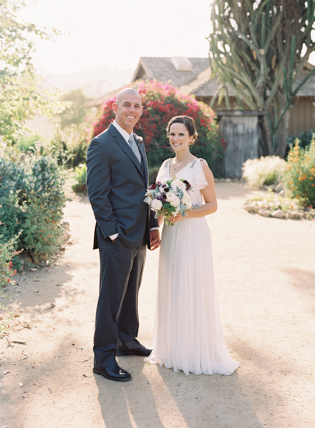 portrait of a bride and groom on their wedding day in orange county