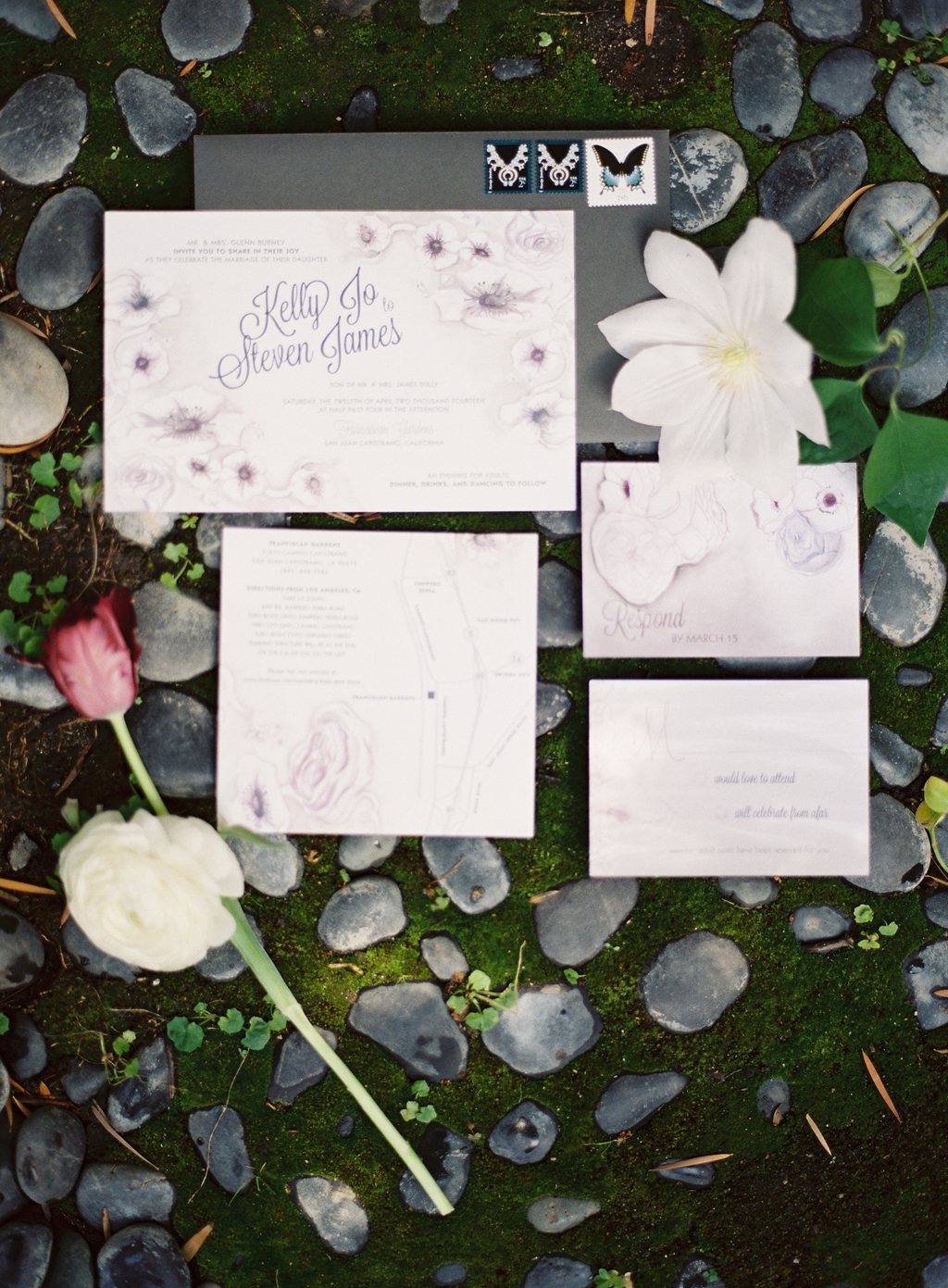 a film photography photograph of a wedding invitation suite in orange county