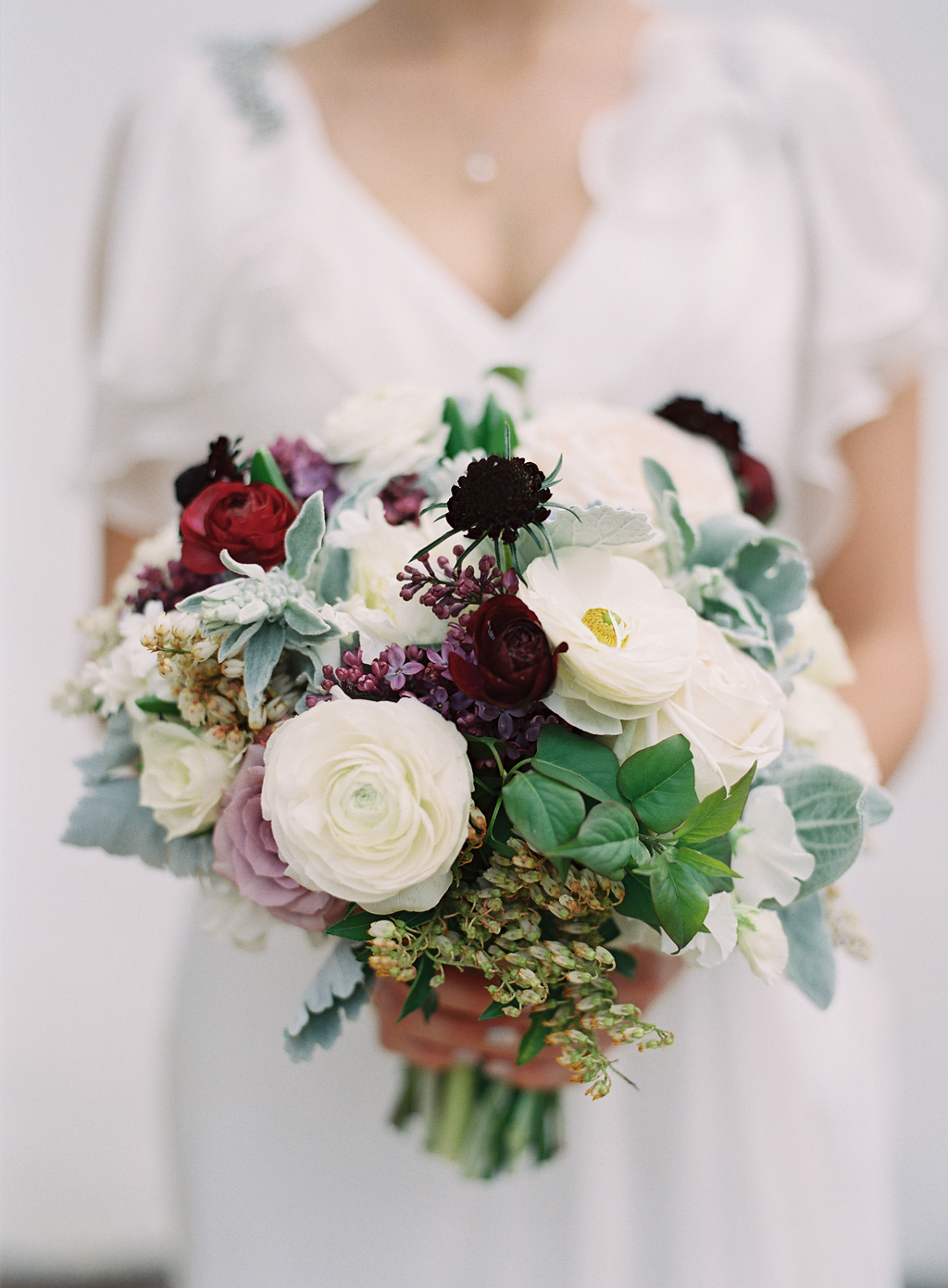 brides bouquet by art with nature on her wedding day at franciscan gardens in orange county