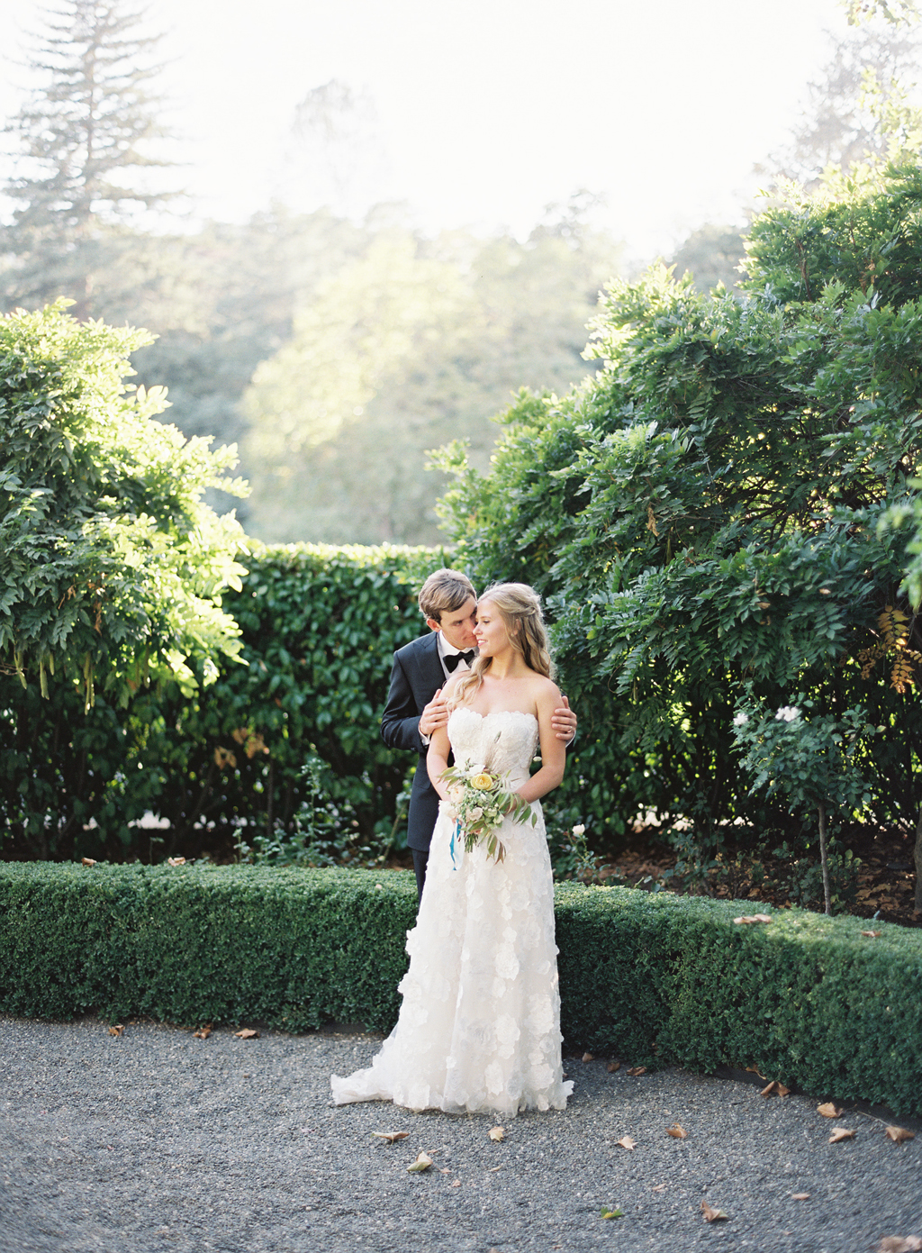 bride and groom portrait shot on fuji 400h at beaulieu gardens in Napa wine country